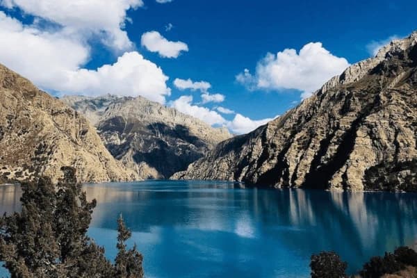Turquoise Gokyo Lake with surrounding Himalayan Mountains in Nepal